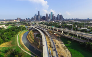 Photo of Houston Skyline Downtown, Photo of highway and green areas intersecting